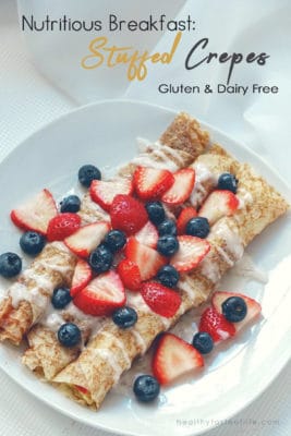 These crepes are perfect for a delicious gluten and dairy free breakfast or brunch, and you can transform them into a dessert if you add sweeteners! They start with a gluten / dairy free crepe recipe, filled with fresh fruit and nuts, finished with dairy free yogurt and honey.