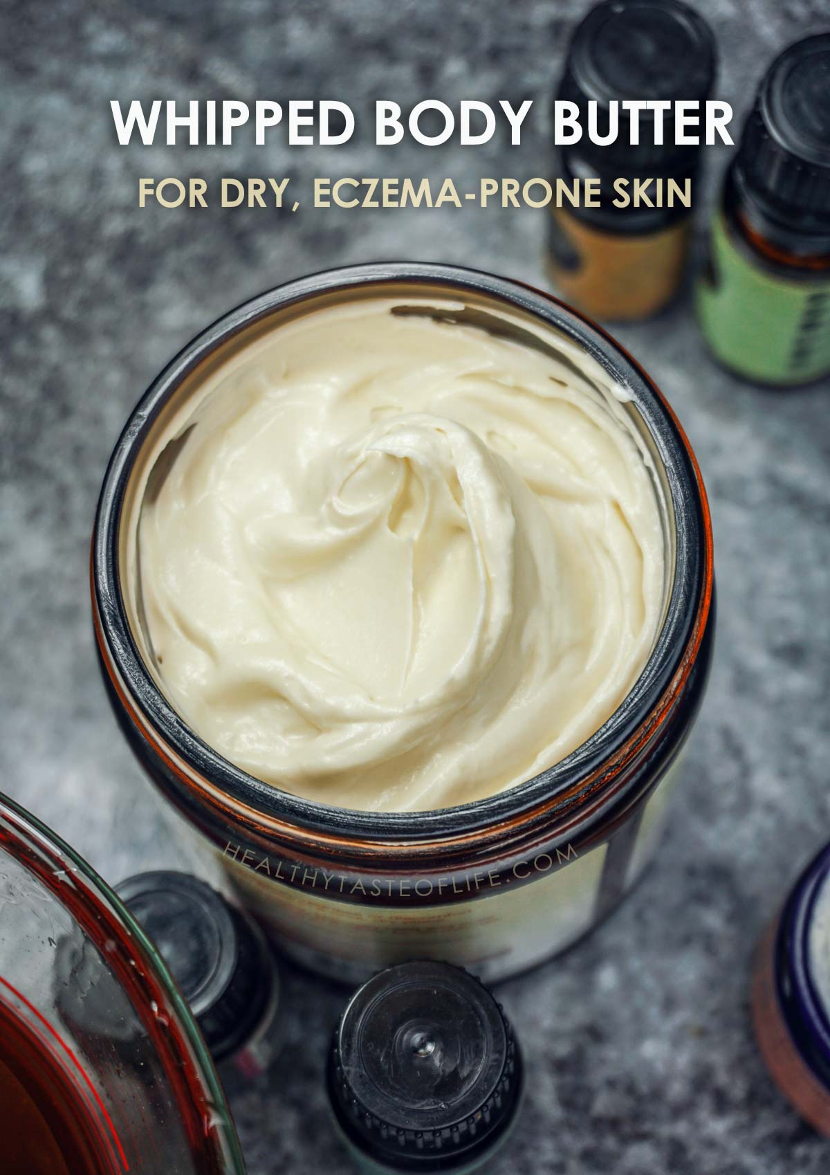 Natural Homemade whipped body butter for dry, sensitive skin made with mango butter, CBD oil, and oat oil - in a glass jar.