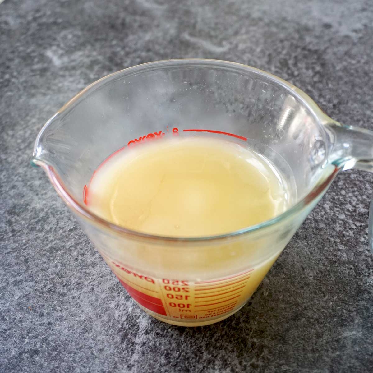 Partially cooled mango butter ready to whip, before adding CBD and oat oils