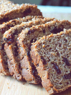 Vegan Gluten Free Banana Bread made with healthy clean ingredients (no eggs, no dairy). This sourdough banana bread recipe is also sugar free, oil free and nut free. Super moist, fluffy and it keeps its shape when slicing, perfect for a vegan gluten free breakfast.