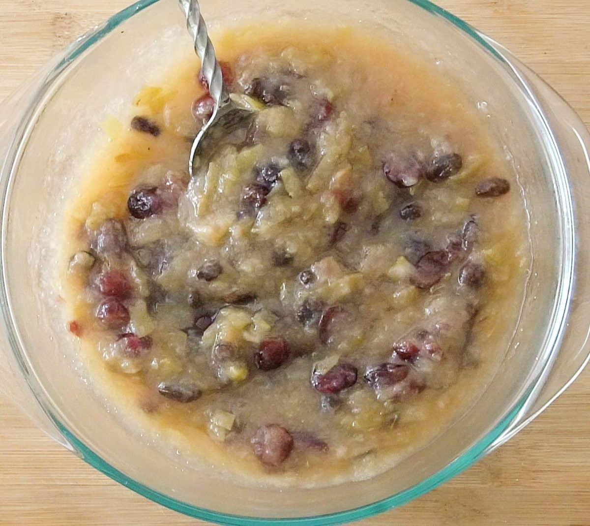 Soft cooked cinnamon apple filling with raisins and cranberries for apple crepe cake