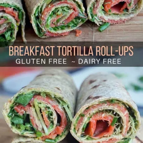 Healthy gluten free tortilla roll-ups assembled with smoked salmon, a dairy free avocado sauce and herbs. These gluten free breakfast roll ups are great as a quick clean eating breakfast on the go or can be cut into pinwheels and served as an appetizer or a filling snack.