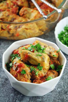 These healthy stuffed cabbage rolls make a delicious gluten free, dairy free, sugar free, clean eating dinner or lunch. The cabbage leaves are stuffed with a mix of wild rice and basmati rice, grass fed ground beef, fresh vegetables, aromatic spices and herbs and baked in the oven until moist and tender.