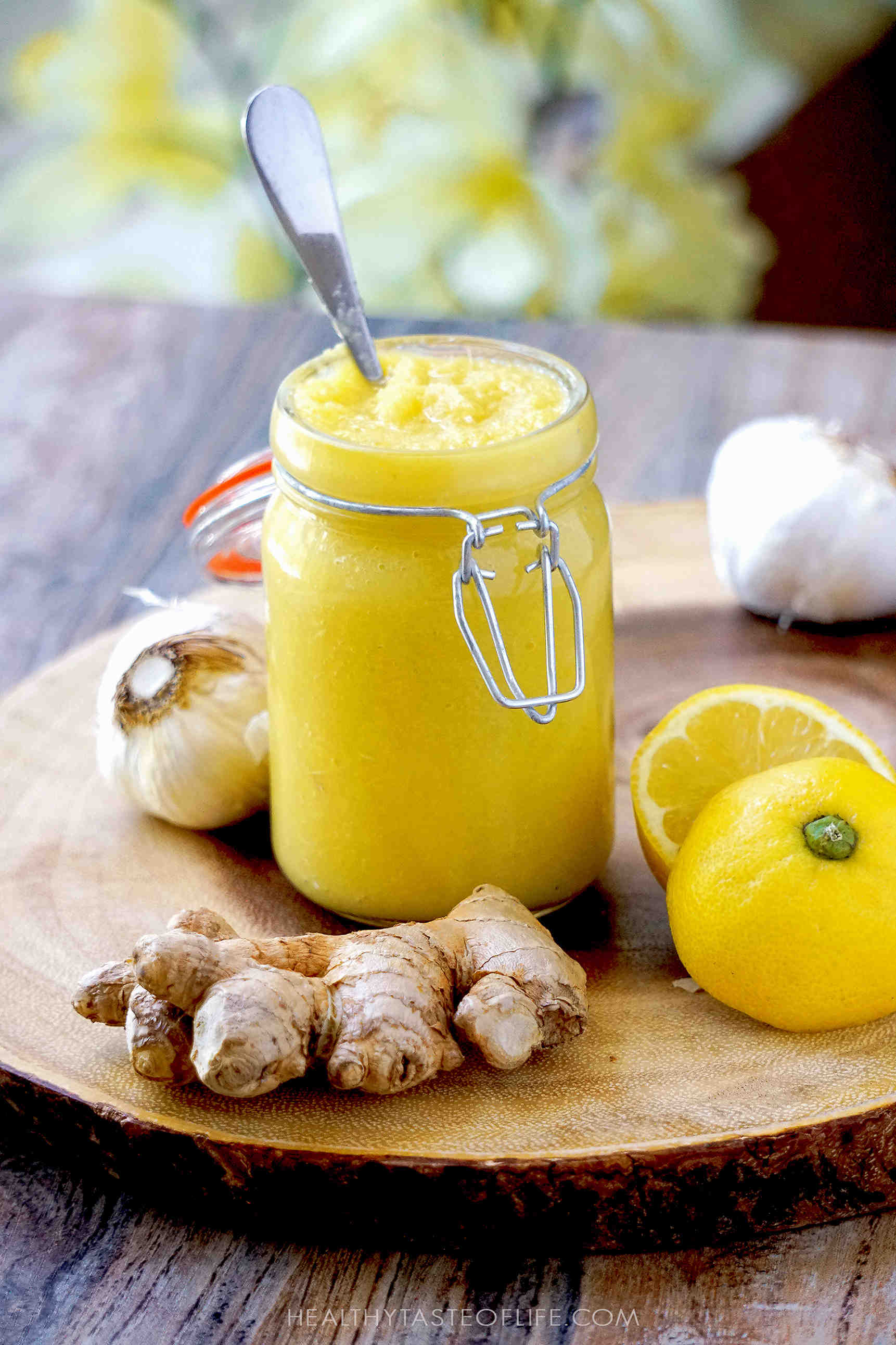 Immunity boosting recipe with lemon ginger garlic and honey mixture, a natural homemade immune booster tonic for cold and flu season.
