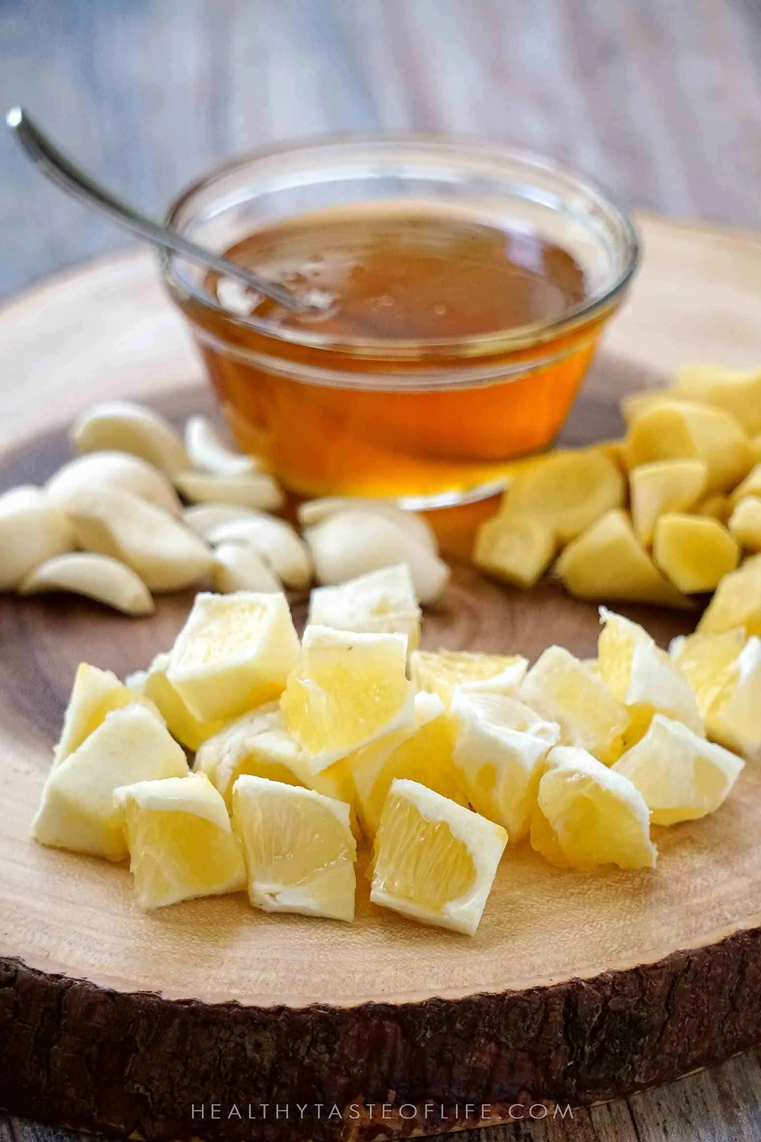 Ingredients for this Immune boosting tonic recipe: honey, lemon, ginger, garlic.