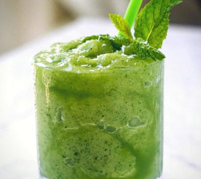 Healthy honeydew smoothie recipe - a refreshing, frosty summer drink made with honeydew melon, fresh mint, lemon juice or lime juice sweetened with coconut condensed milk (if the melon is unripe) - healthy, vegan, & gluten free summer smoothie.