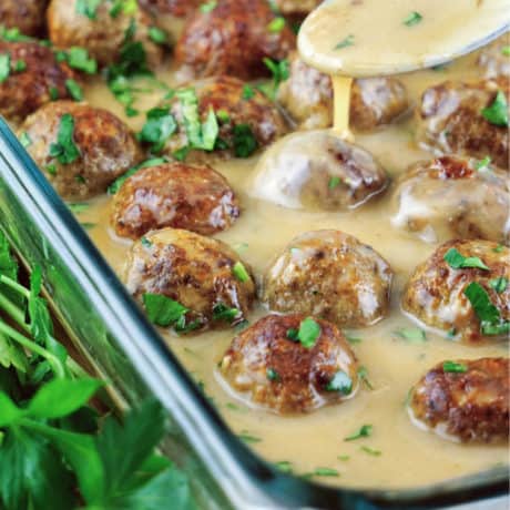 Healthy gluten free Swedish meatballs recipe (whole30, keto, paleo options) made with ground turkey and beef, oven baked and perfectly browned served with a creamy dairy free Swedish meatballs sauce.