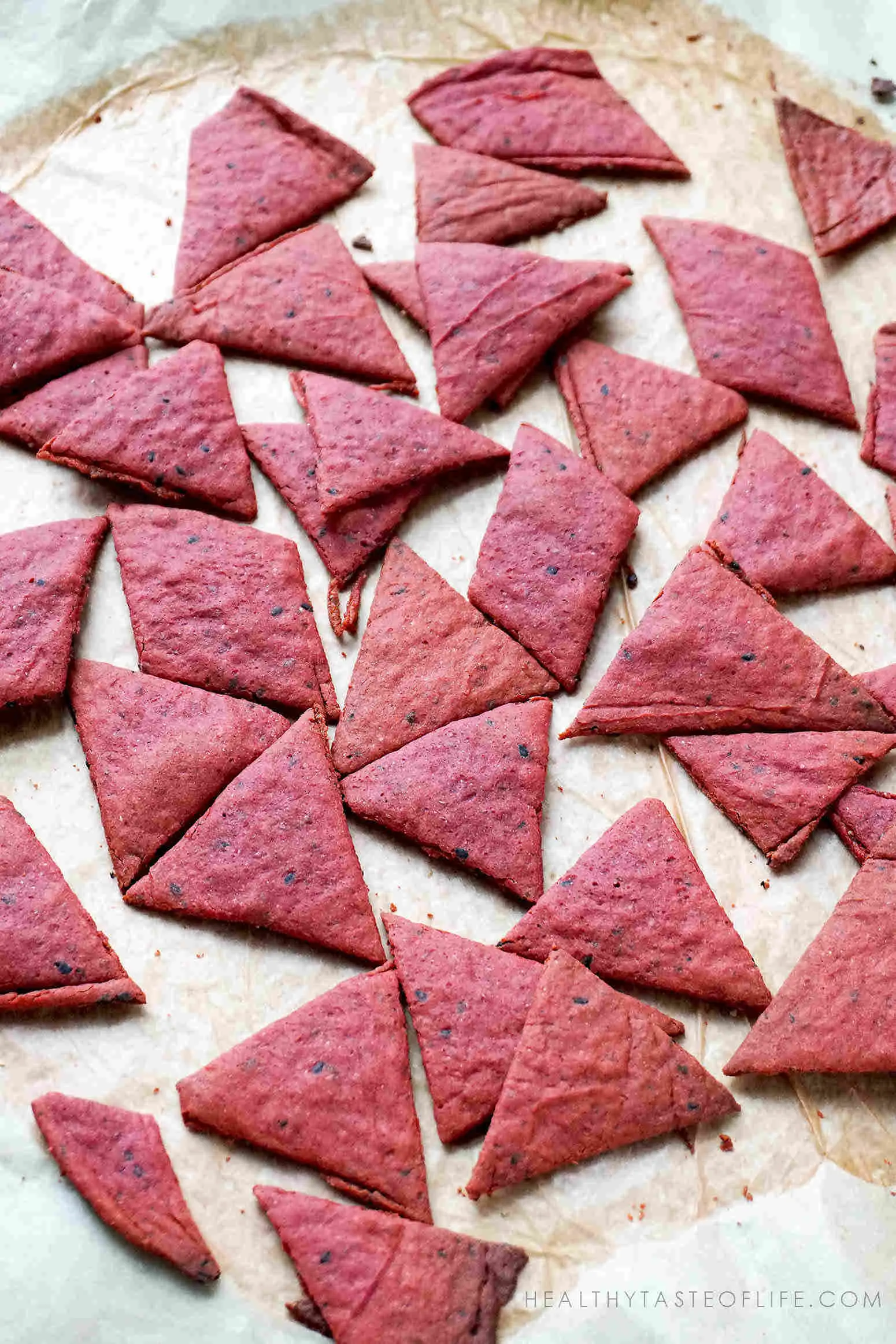 beet crackers cut into triangular pieces