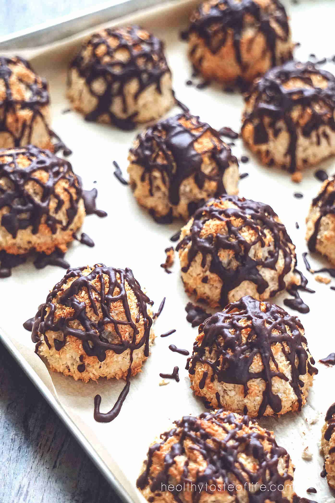 Healthy gluten free coconut macaroons recipe - low carb, dairy free made with egg whites and without condensed milk drizzled with chocolate.