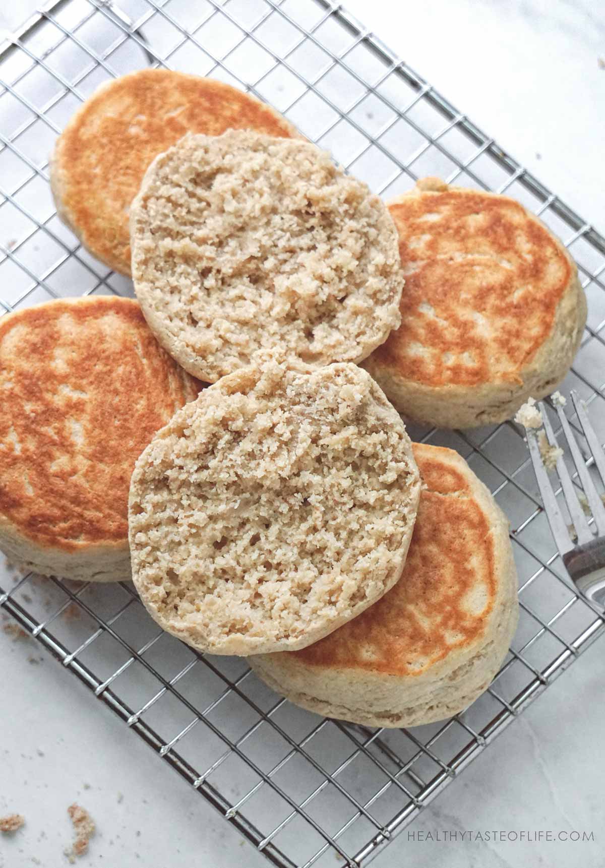 Gluten-free sourdough English muffins vegan no yeast no egg - fork split  showing nooks and crannies - overhead shot