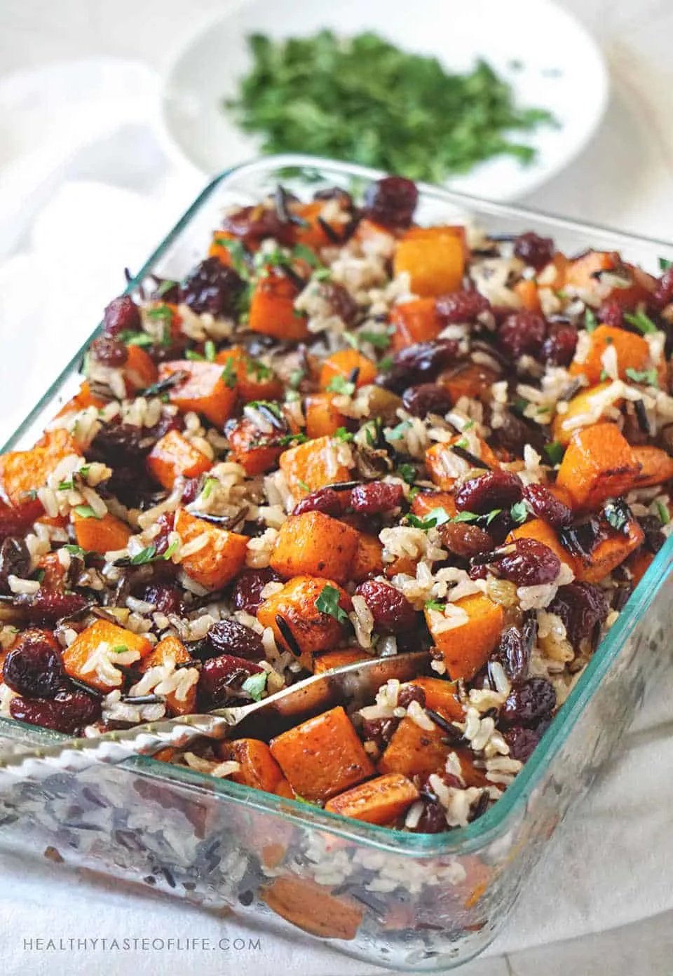 Healthy Butternut Squash Casserole with sweet potatoes and rice finished with a sweet balsamic sauce, perfect as a side dish or meal. This vegan butternut squash casserole is easy to make and stores well. 
