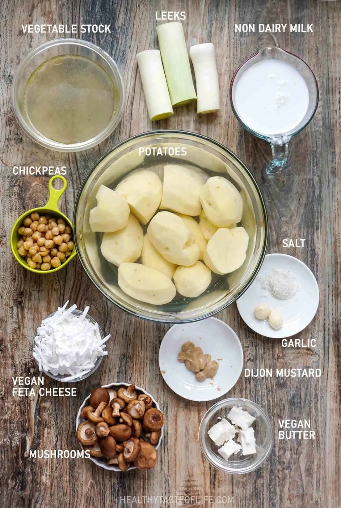 Vegan Potato Bake Ingredients presented in quantities on a board.