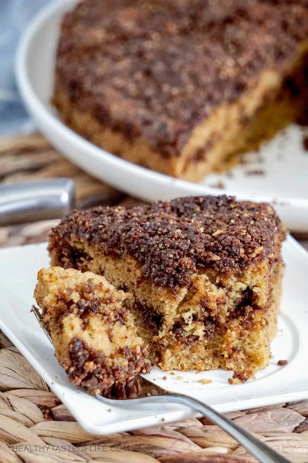 Dairy free gluten free coffee cake with cinnamon, walnut coffee crumb. A gluten free coffee cake recipe that you will enjoy again and again. Its easy, moist, fluffy and stays like this for days! #glutenfreecoffeecake #dairyfree #glutenfree #refinedsugarfree #coffeecake