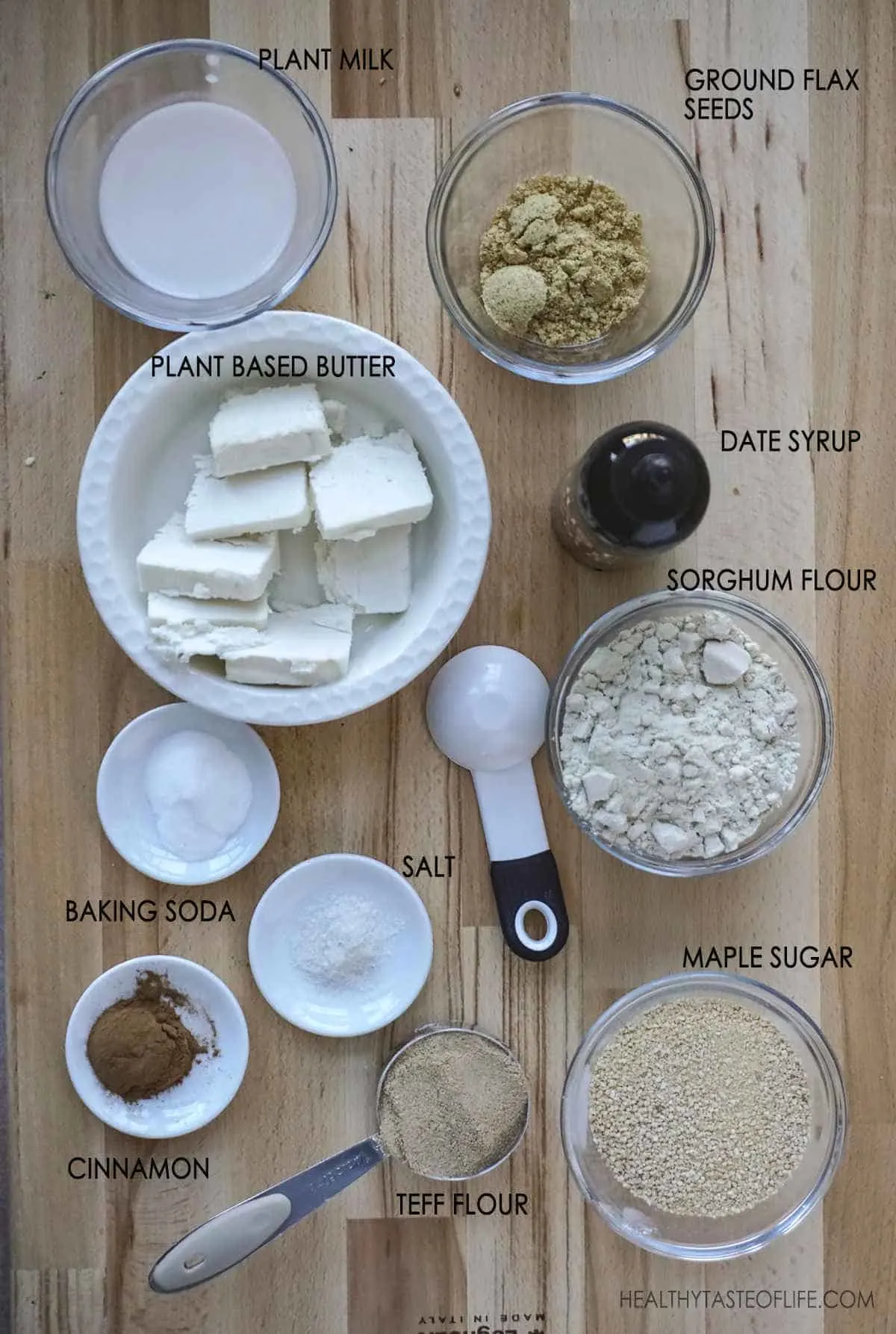 Ingredients For Vegan Gluten Free Graham Cracker Recipe: teff flour, sorghum flour, vegan butter, maple sugar, flax seeds, date syrup, plant based milk, baking soda and cinnamon.