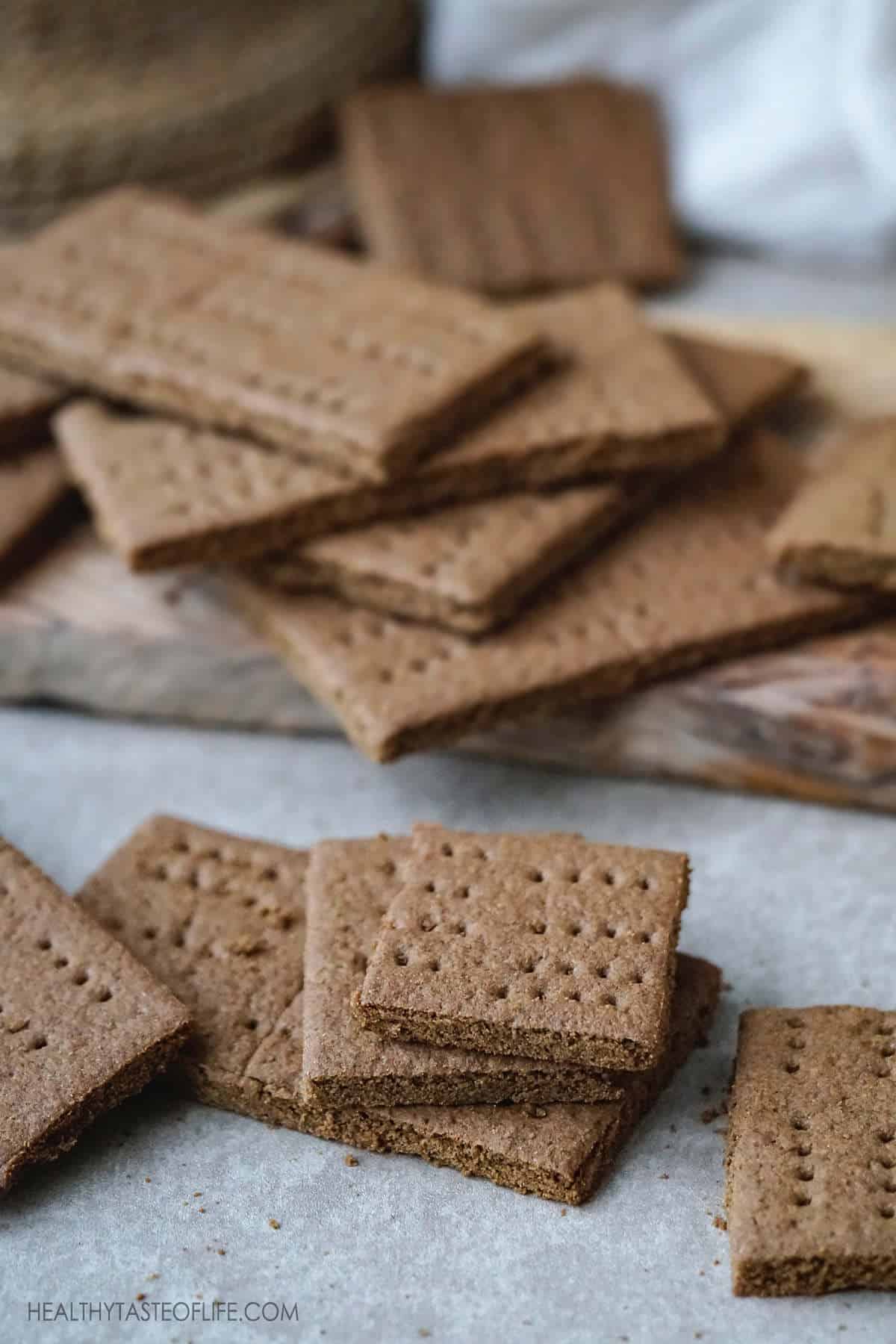 Baked crispy gluten and dairy free graham crackers with teff flour.