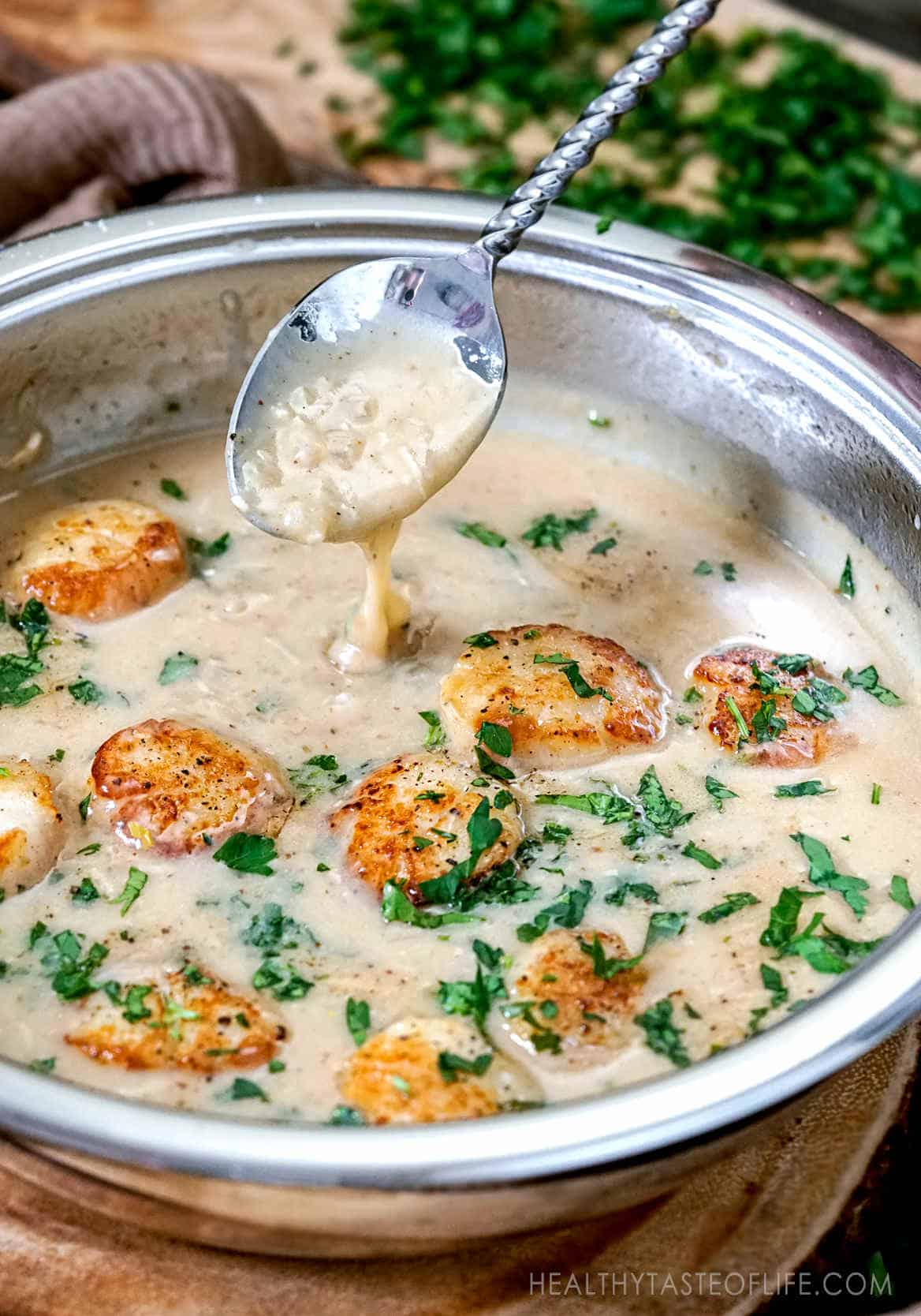 Whole30 and paleo scallops with a dairy free creamy sauce. Gluten free, dairy free dish perfect for dinner or lunch. 