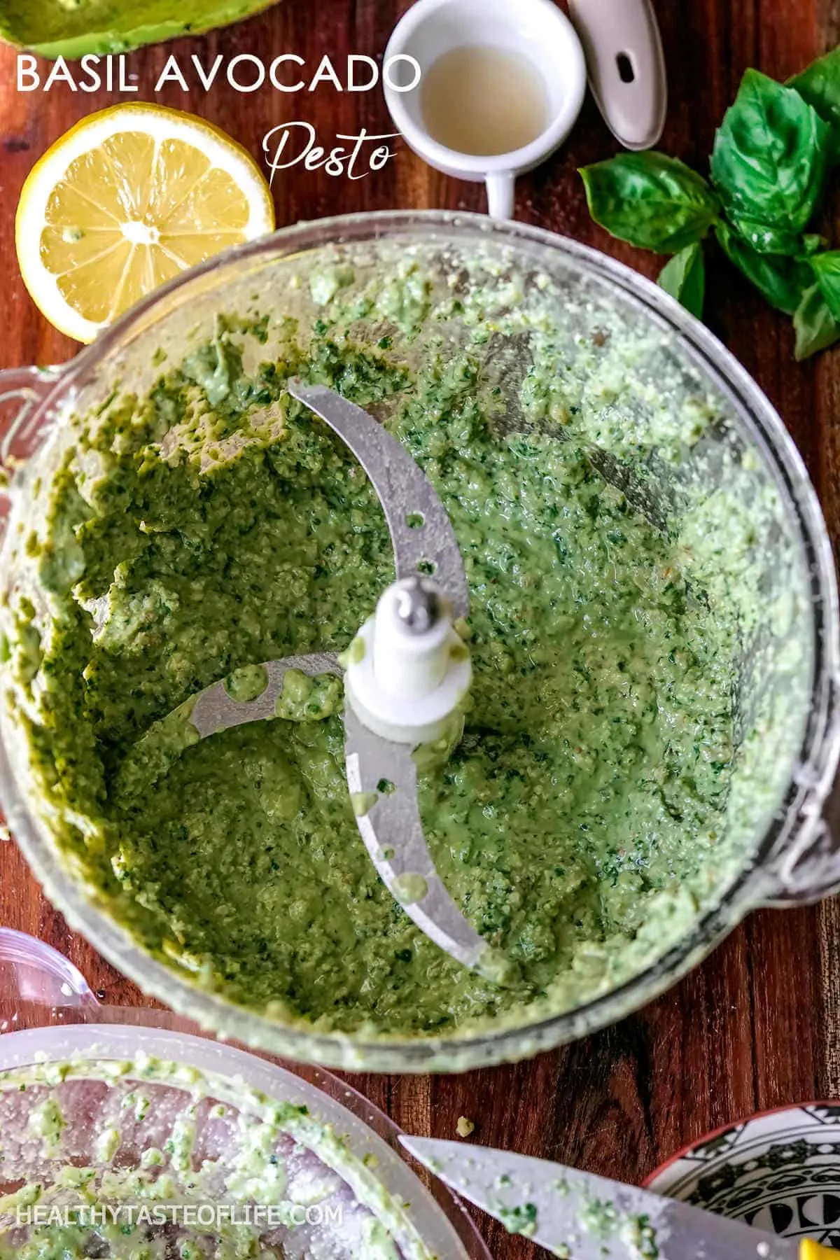 Pesto for soba noodles made with avocado, walnuts, parsley, lemon, garlic, maple syrup and sea salt blended in a food processor.