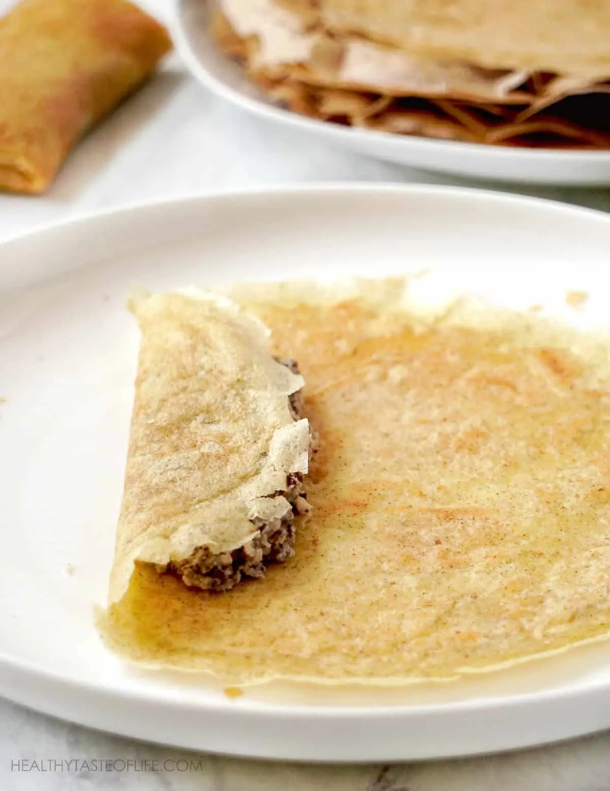 How to make grain free crepes from scratch and fill them up with meat filling.