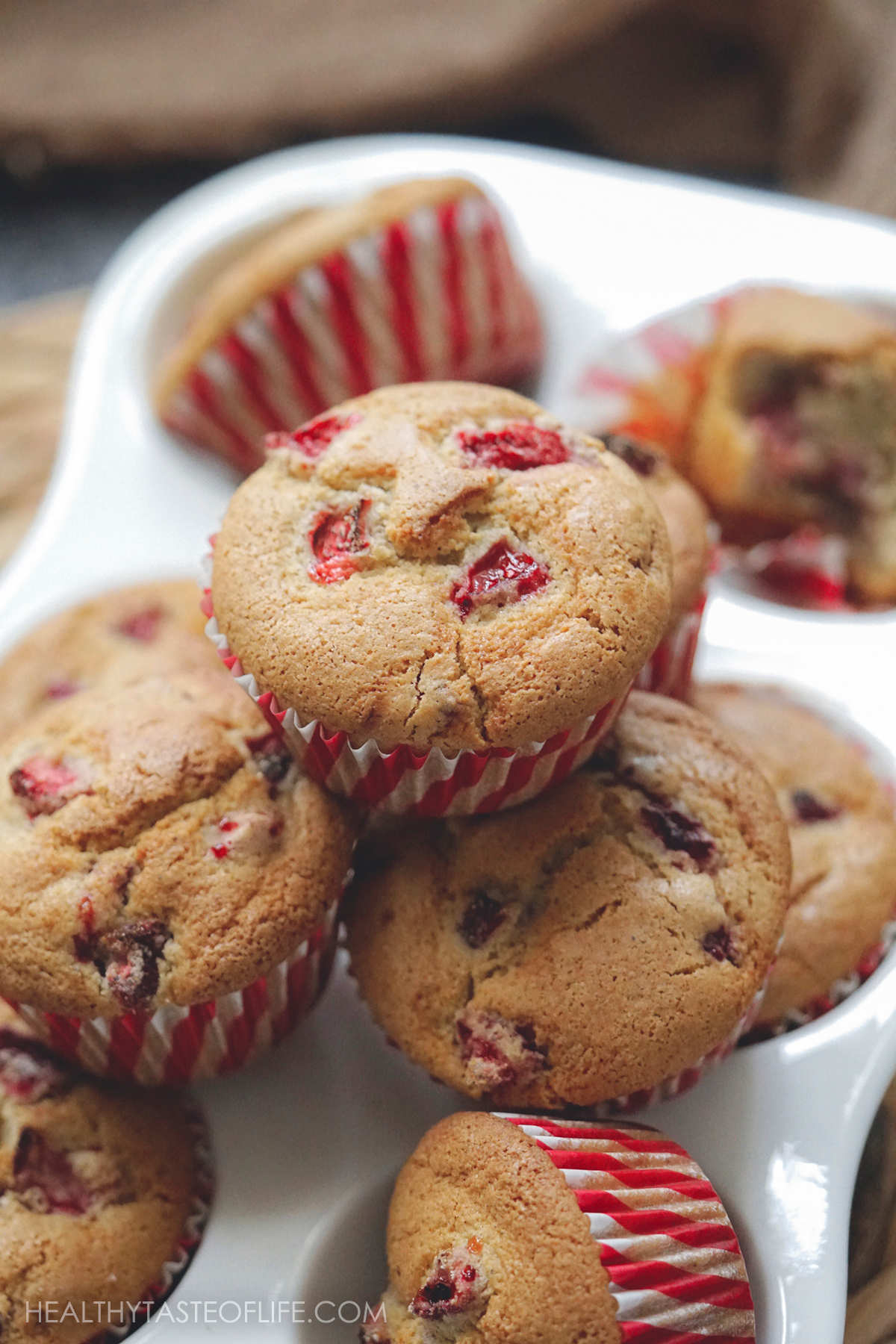 Healthy Strawberry muffins with frozen strawberries and without refined sugar.  #strawberrymuffins #healthy #glutenfree #dairyfree #strawberry #easy #recipes #cleaneating
