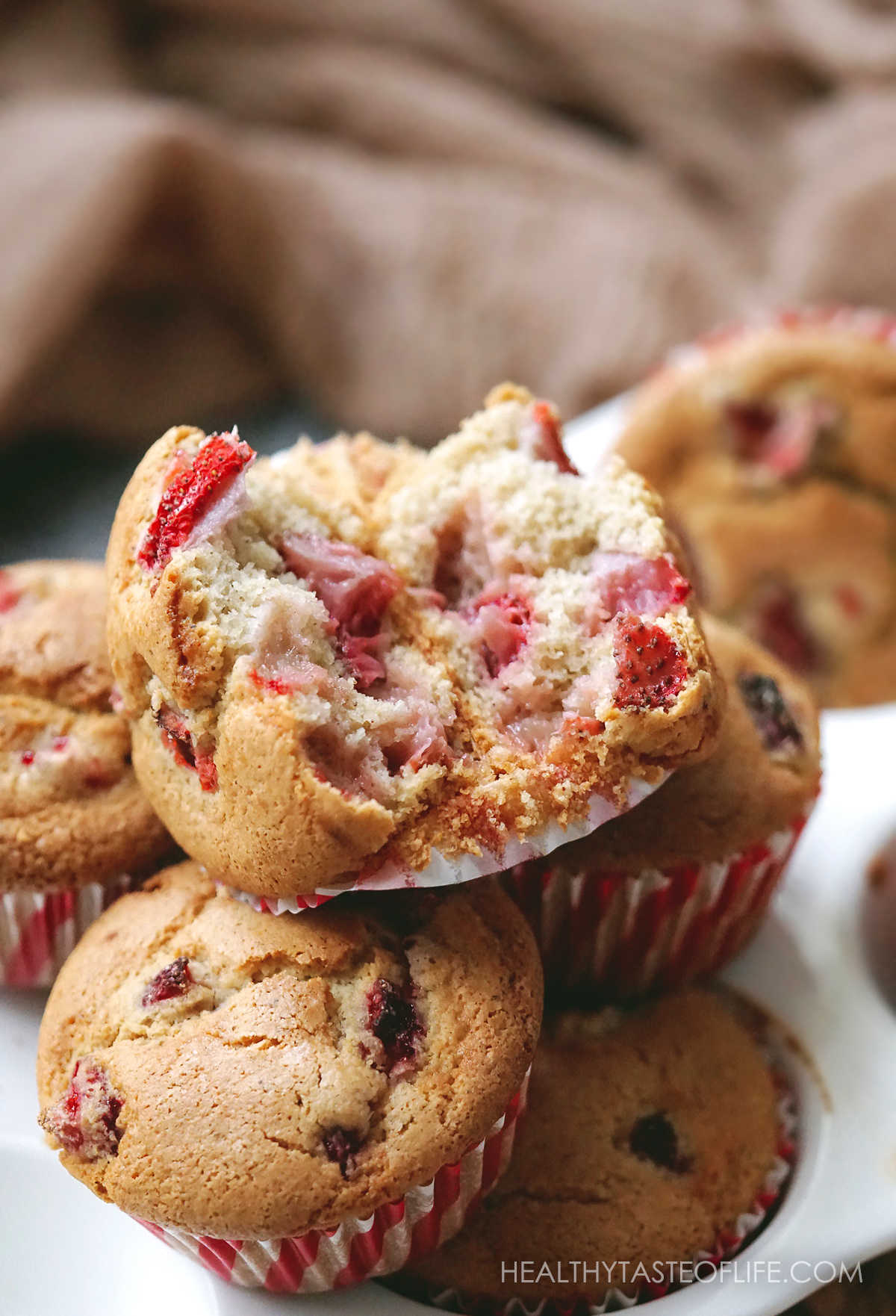 Pictures howing the inside texture of this healthy strawberry muffins - soft and fluffy gluten free dairy free strawberry muffin, 