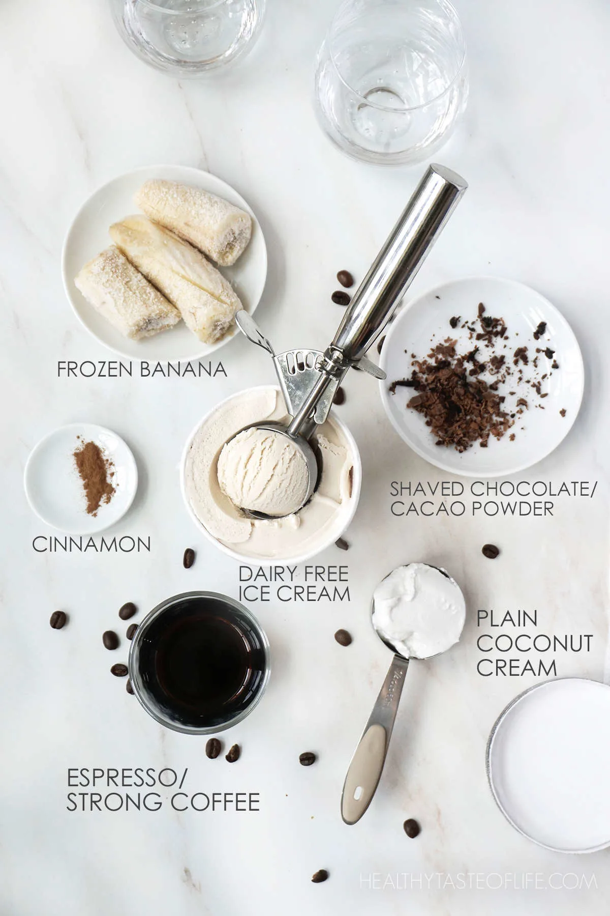 Ingredients needed for a coffee milkshake recipe displayed on a board, all measured. 