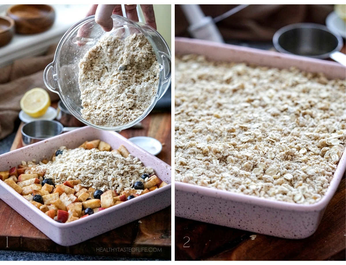 Process shot: layering the blueberry and apple crumble in a square baking pan.