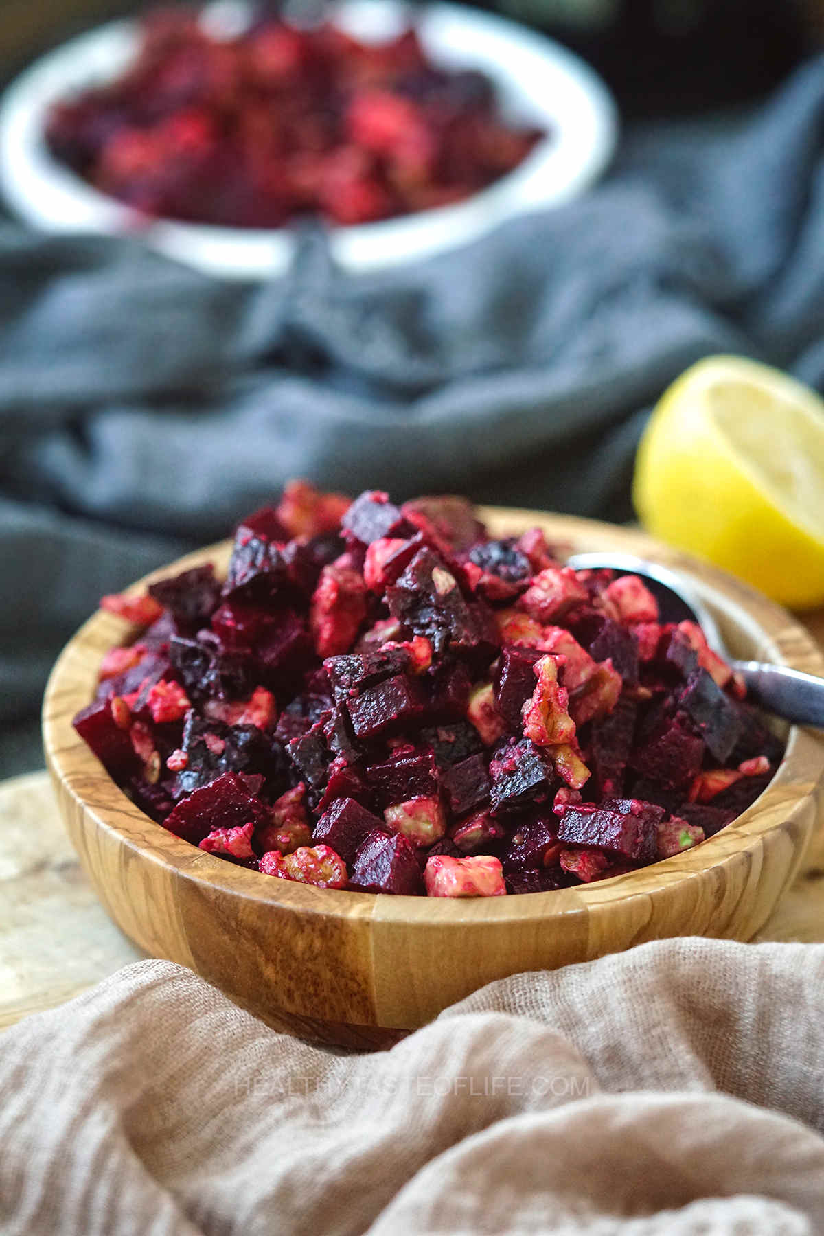 Sweet earthy beets with crunchy walnuts and prunes and lots of creamy avocado for a simple salad with Eastern European style - Russian beet salad.