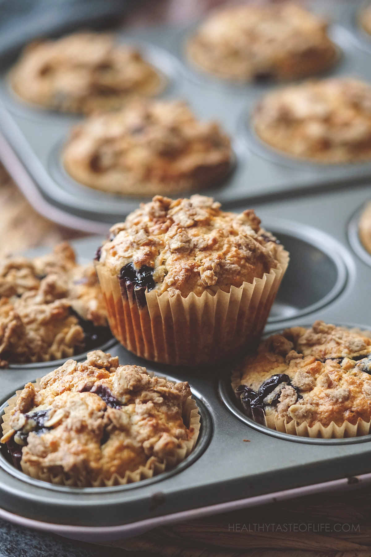 Blueberry banana oatmeal muffins in the muffin tin.
