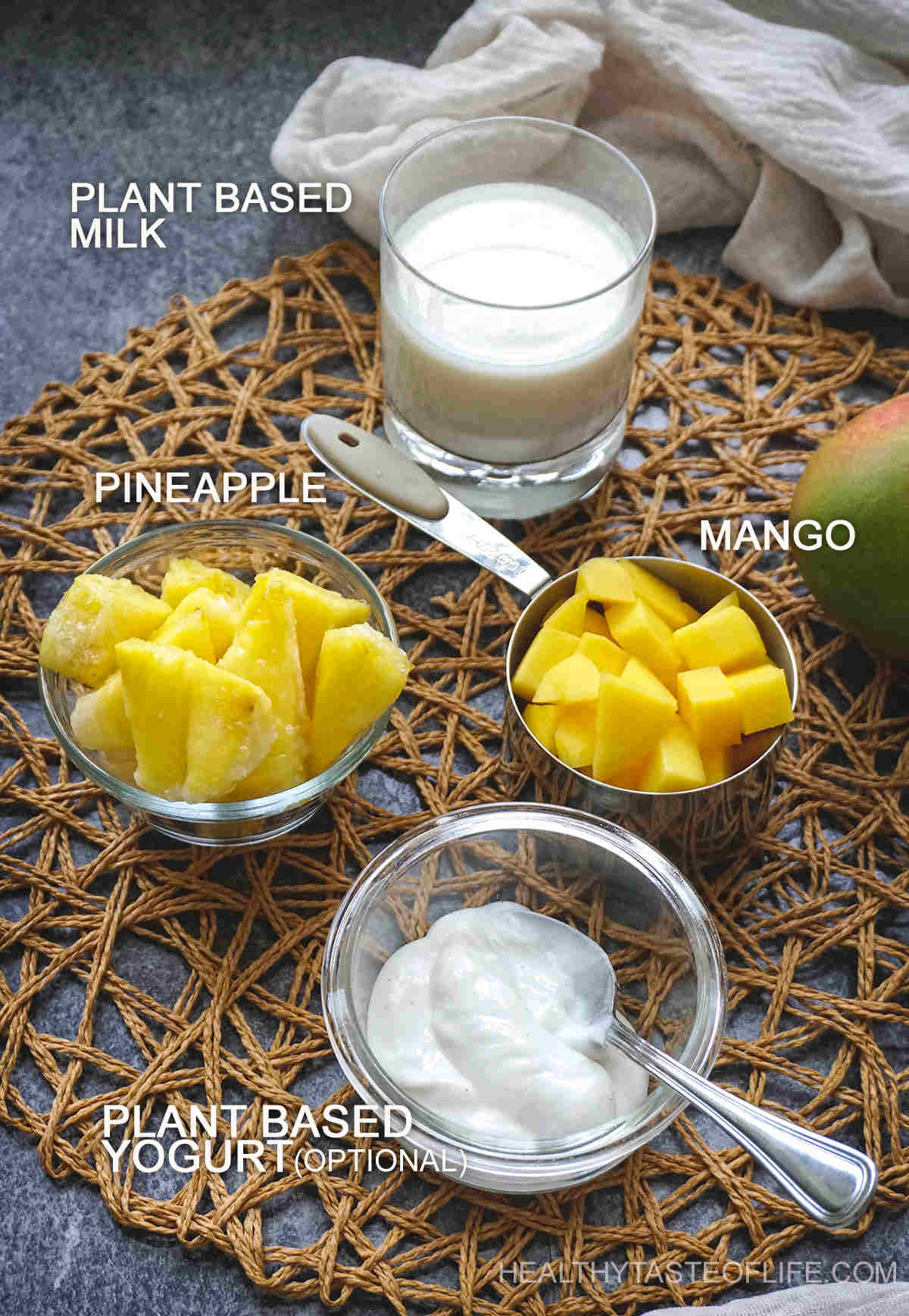Ingredients for dairy free pineapple and mango smoothie.