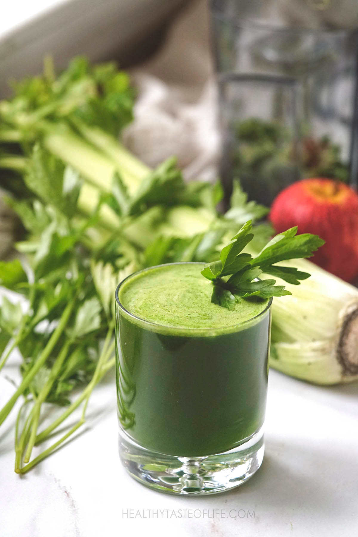 Green juice for inflammation made with celery, parsley, leafy greens and apple.
