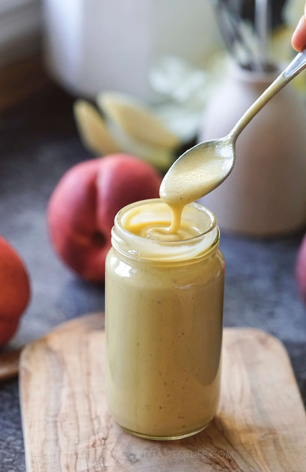 Peach salad dressing, creamy and smooth made with peach fruit, oil, vinegar and mustard.