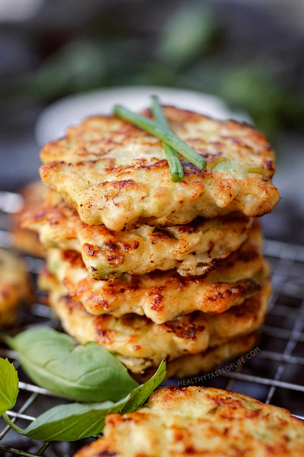 Stack of cooked chicken fritters.
