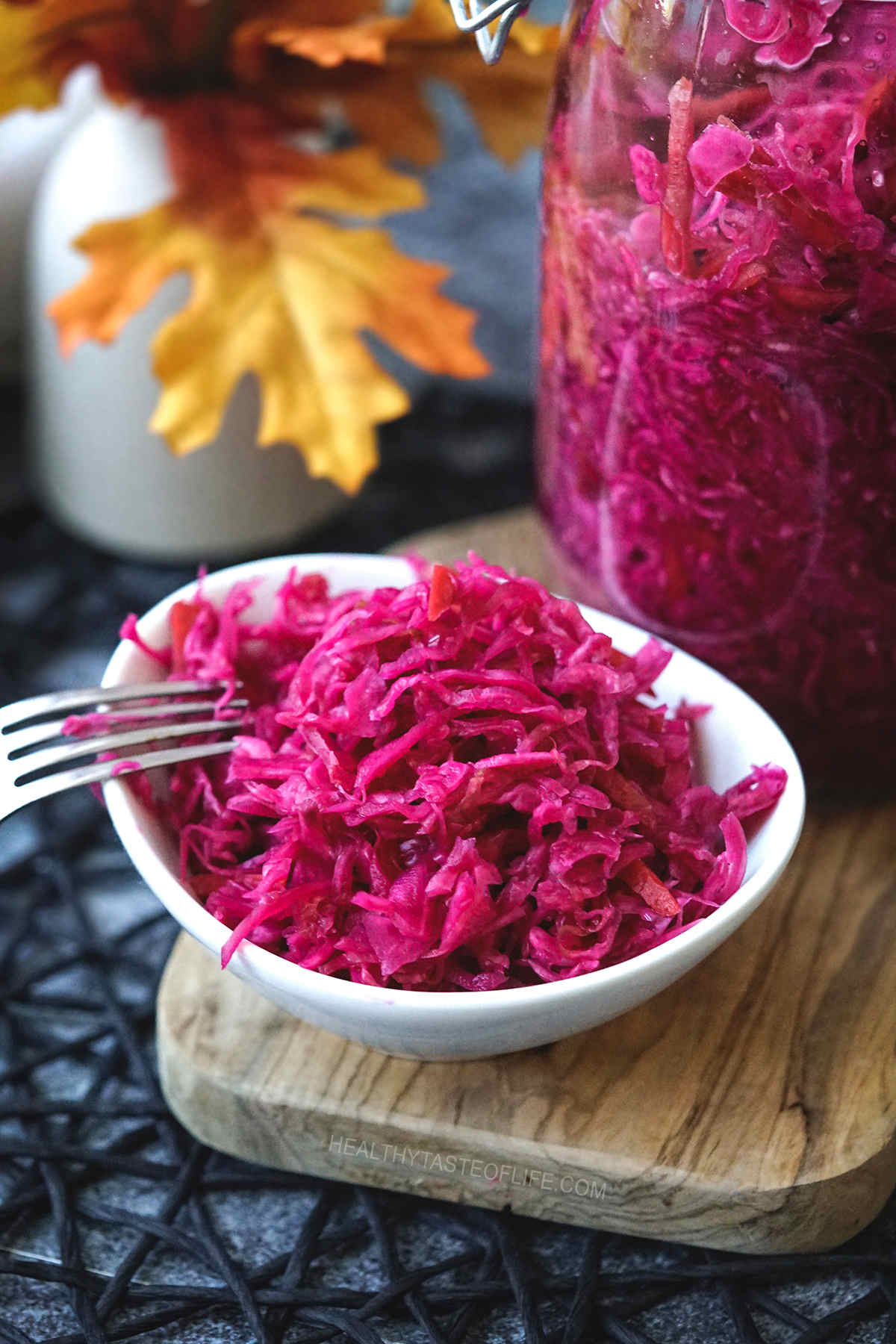 Serving fermented red cabbage in bowl as a side dish.