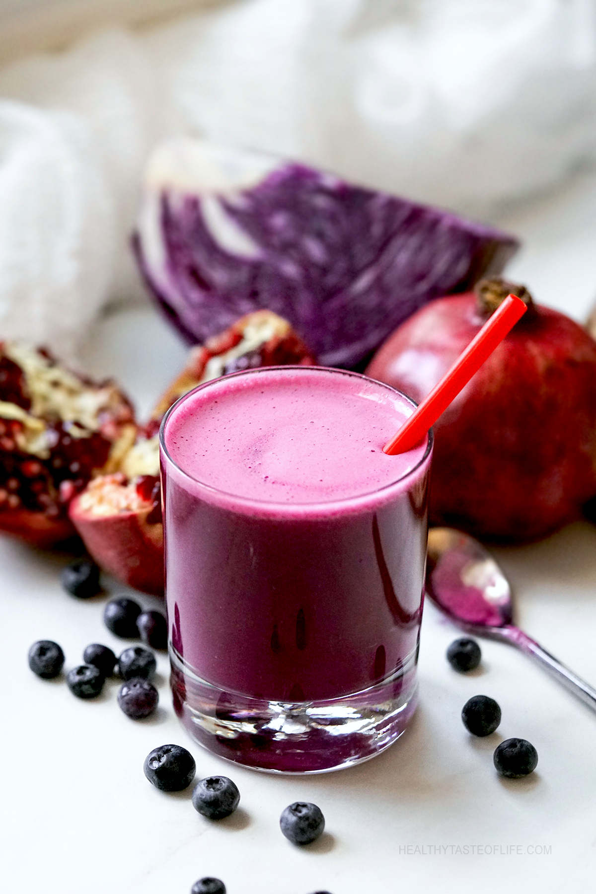 Anti-cancer juice made with red cabbage pomegranate and blueberries.