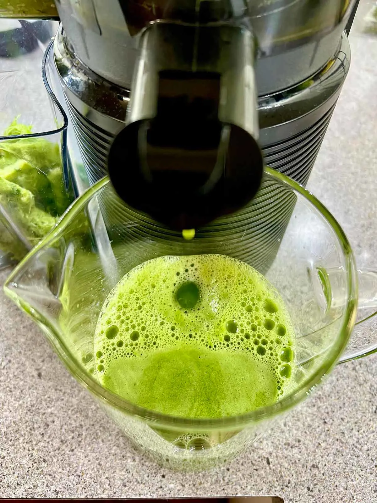 Close-up photo showing the celery and pineapple juice freshly made.