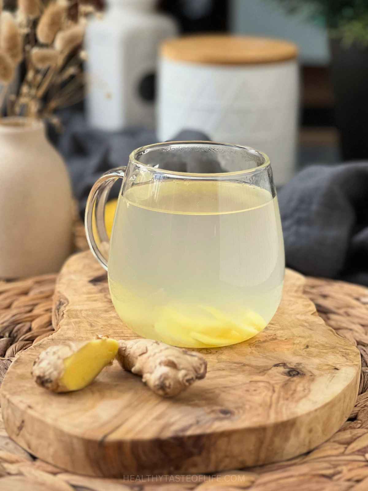 Freshly made ginger infused water in a mug.