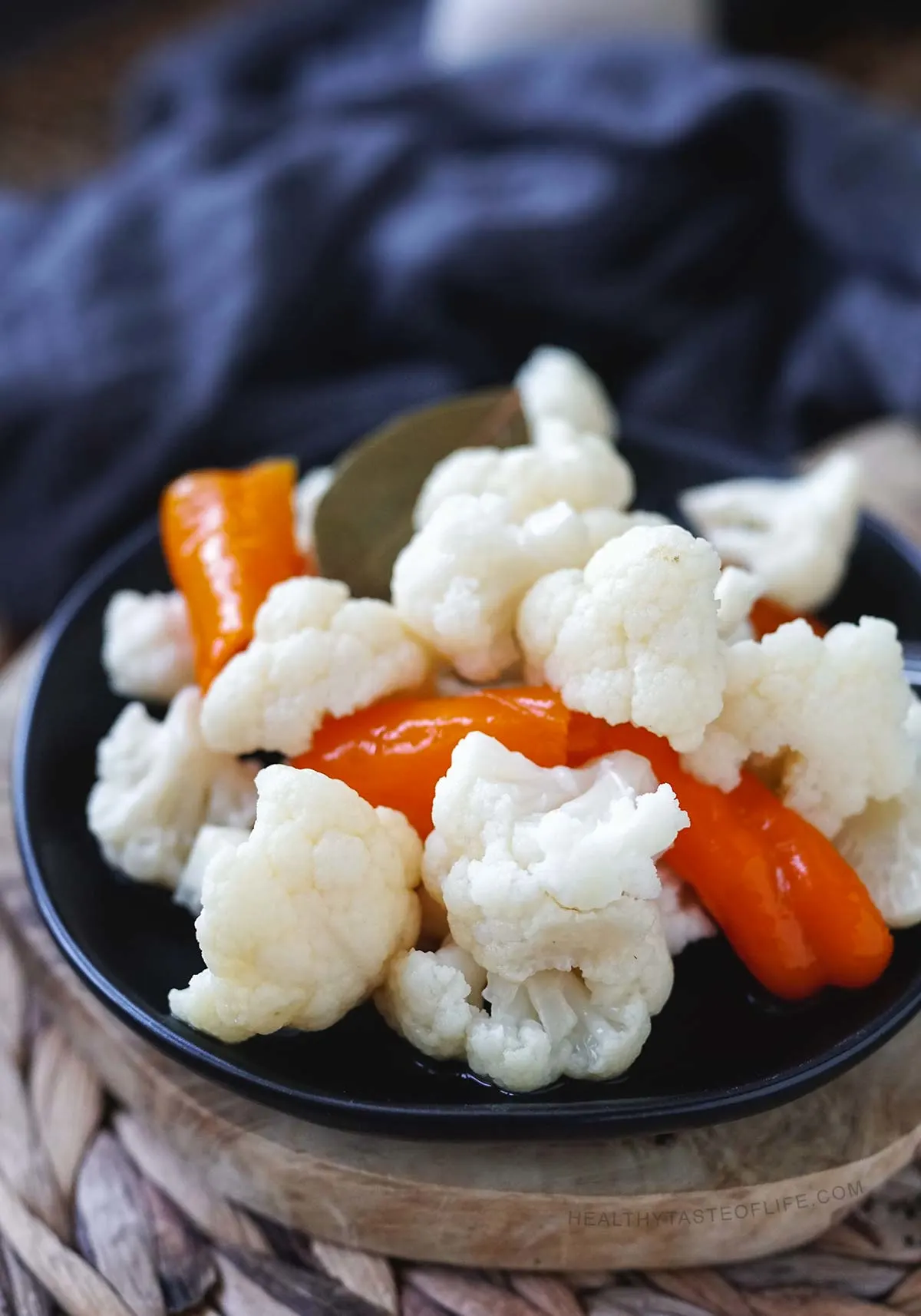 Crunchy fermented cauliflower with sweet peppers ready to be enjoyed.