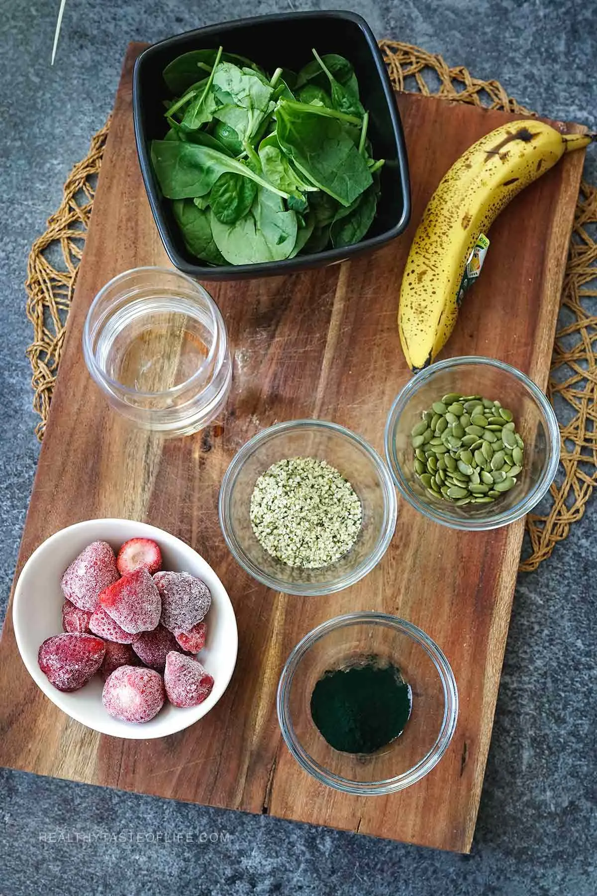 ingredients for high iron smoothie displayed on a board