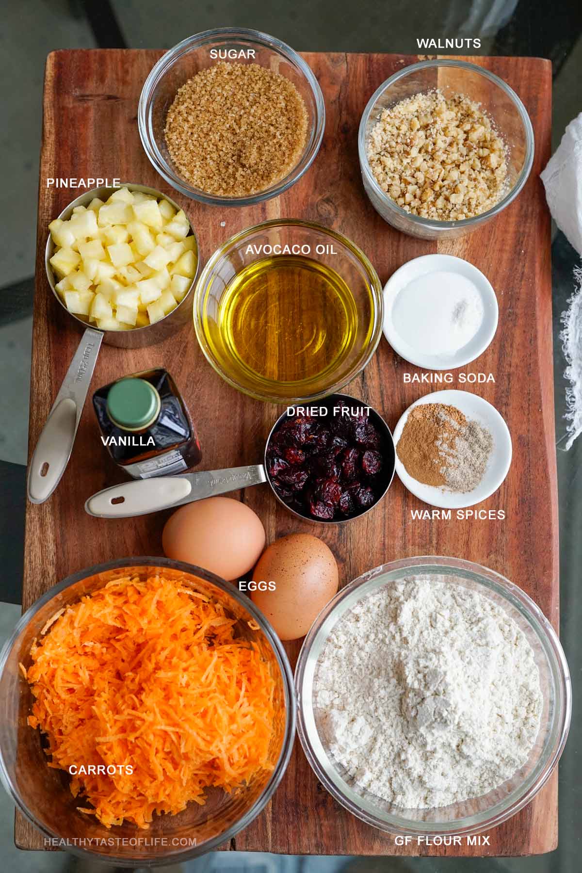Measured Ingredients for Gluten-Free Carrot Pineapple Muffins displayed on a board