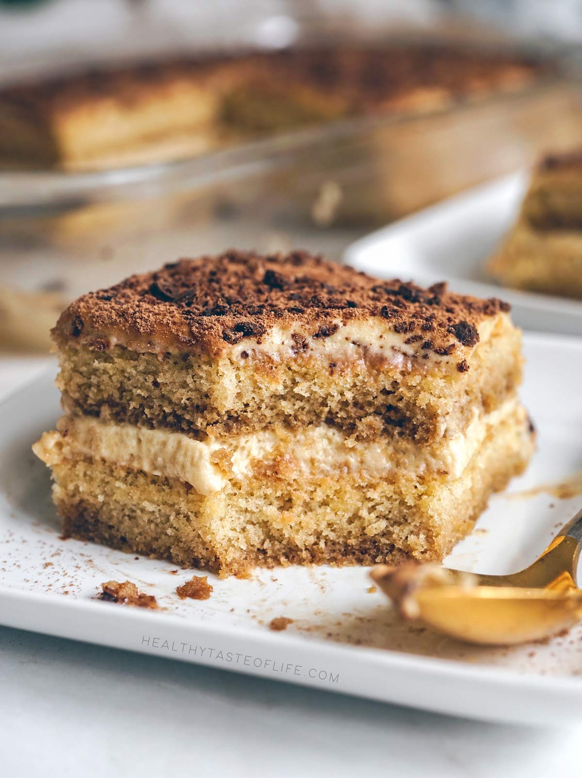 a bite of gluten free dairy free tiramisu taken with a spoon showing texture inside