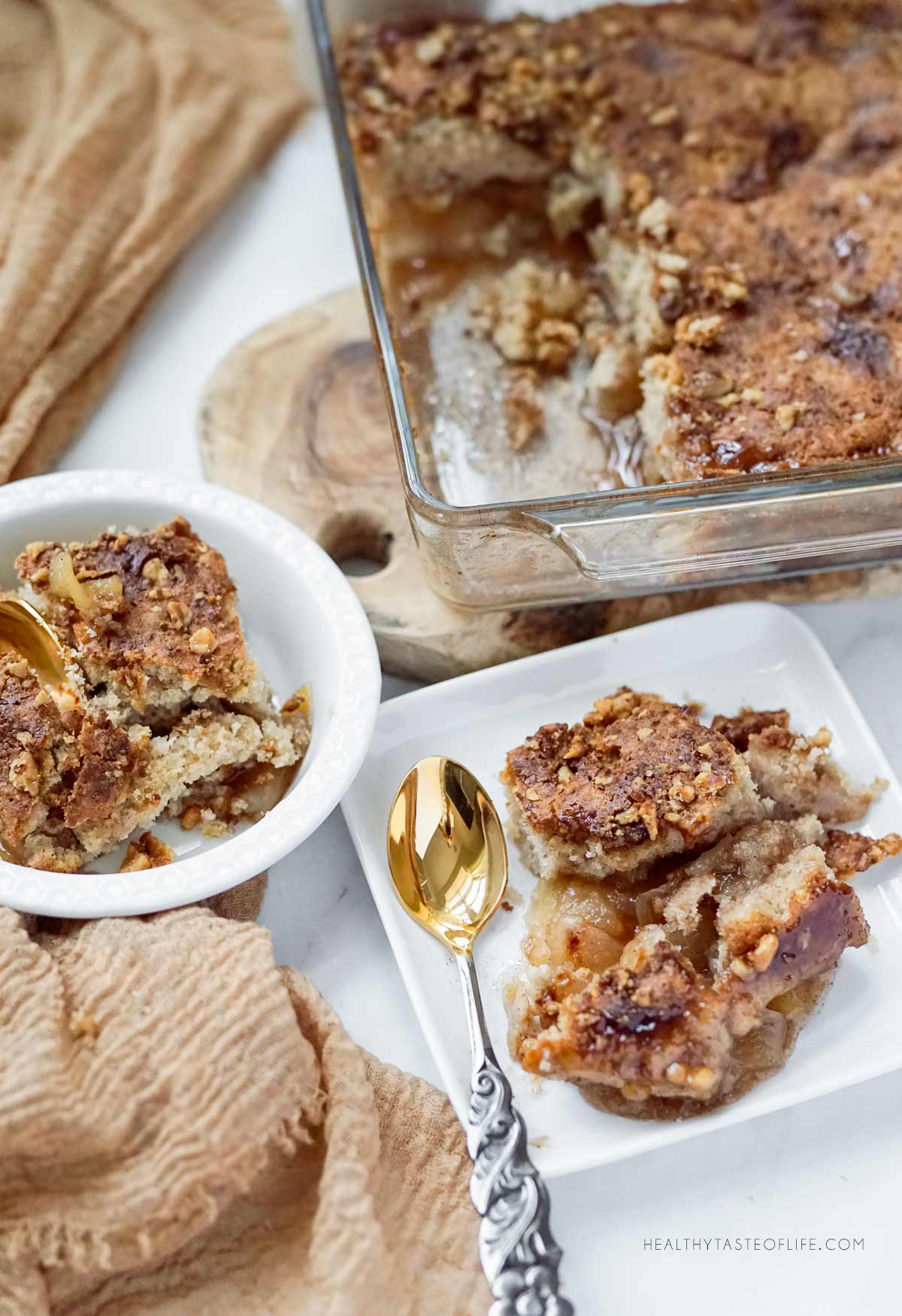 Serving of Gluten Free Apple Cobbler with Buttery Biscuit Topping overhead shot